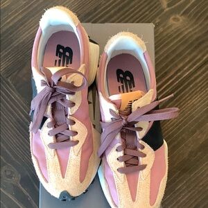 New Balance women’s size 7 327 in pink/black combo $55